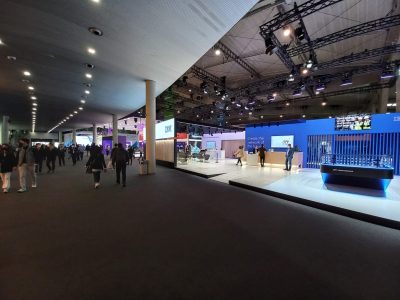 La imagen muestra MWC Barcelona después de haber sido implementado por Merchanservis.